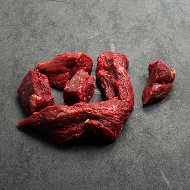 Angled view of beef tenderloin tips.
