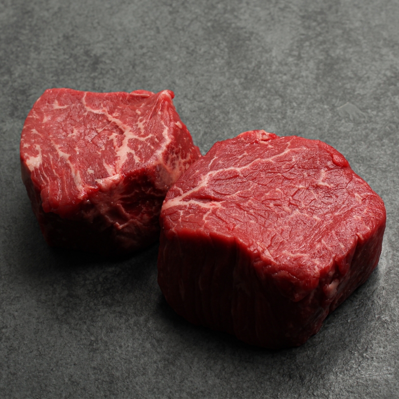 side angle image of raw steak cut from top sirloin beef