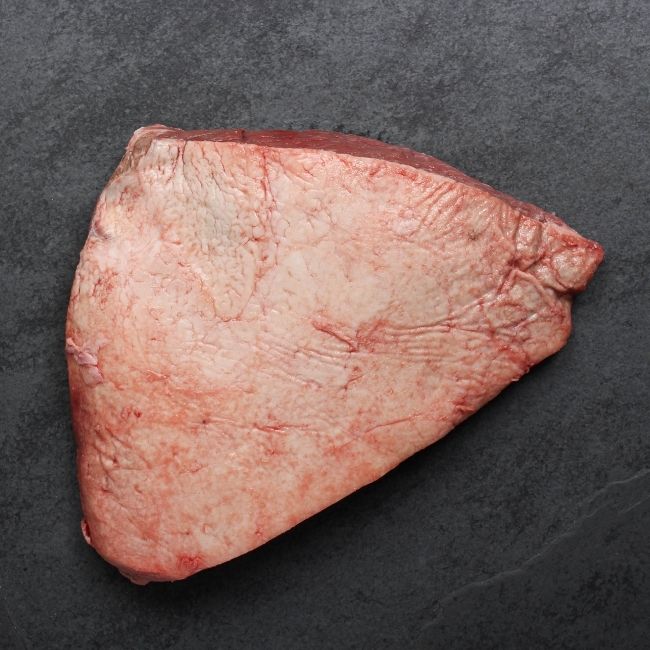 overhead image of the fat cap side of a whole raw picanha roast