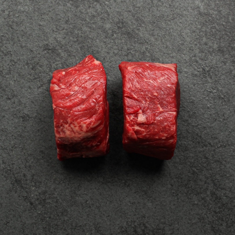 side angle image of raw steak cut from top sirloin beef