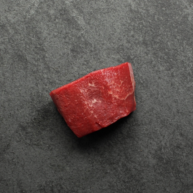 overhead shot of a raw 4 oz aaa beef filet mignon steak