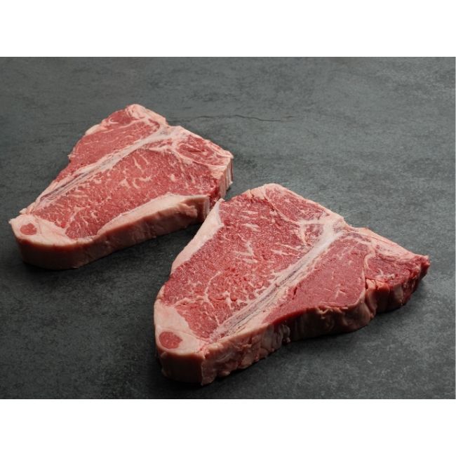 Size comparison of two t-bone steaks.