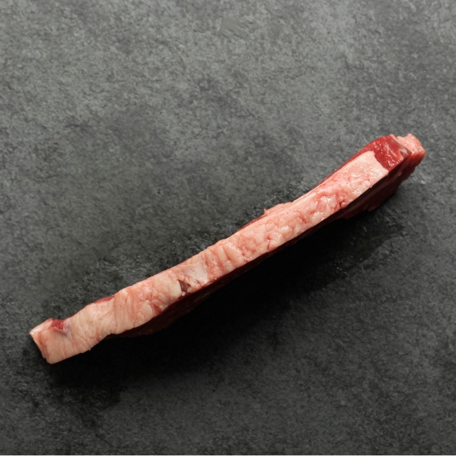Side view of a sandwich steak.