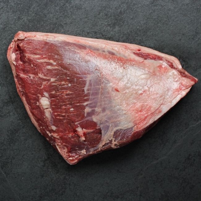 overhead image of the underside of a whole raw picanha roast
