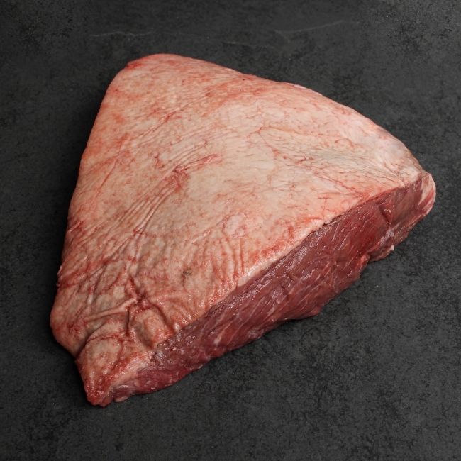 side view of a whole raw picanha roast